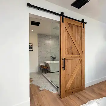 knotty alder K design sliding barn door for bathroom with lock