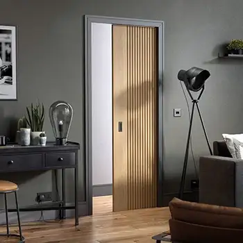 Interior bedroom batten wood hidden sliding door in wall cavity