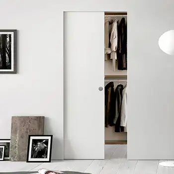 White interior wooden trimless pocket sliding closet door